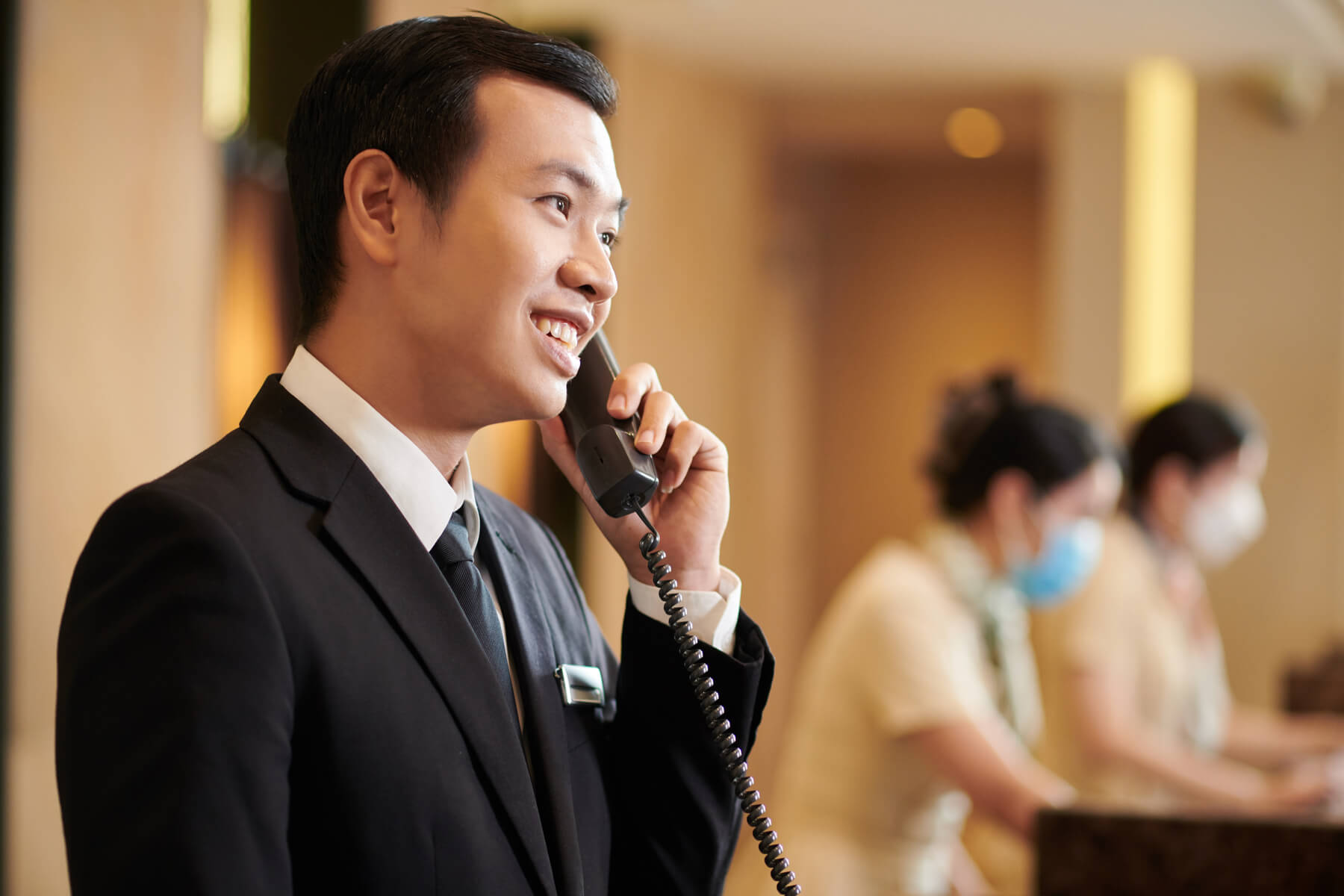 hotel manager answering call from guest 2023 11 27 05 35 24 utc 1 1.jpg