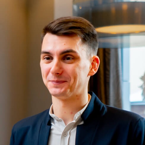 the receptionist at the counter meets guests with 2024 02 07 20 23 54 utc cropped.jpg